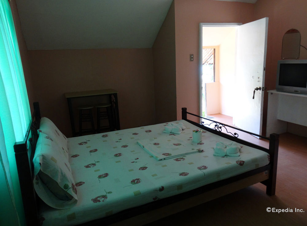 Punta Del Sol Araceli Beach Resort Самал Екстериор снимка
