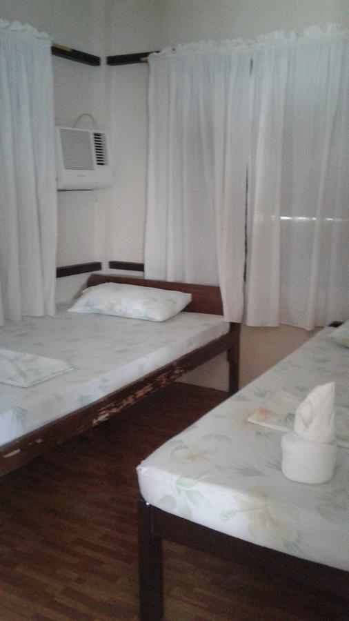 Punta Del Sol Araceli Beach Resort Самал Екстериор снимка