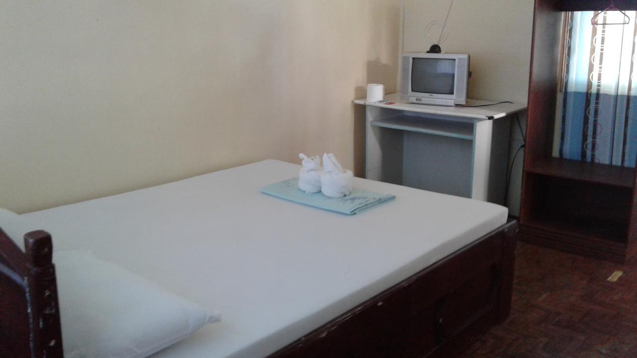 Punta Del Sol Araceli Beach Resort Самал Екстериор снимка