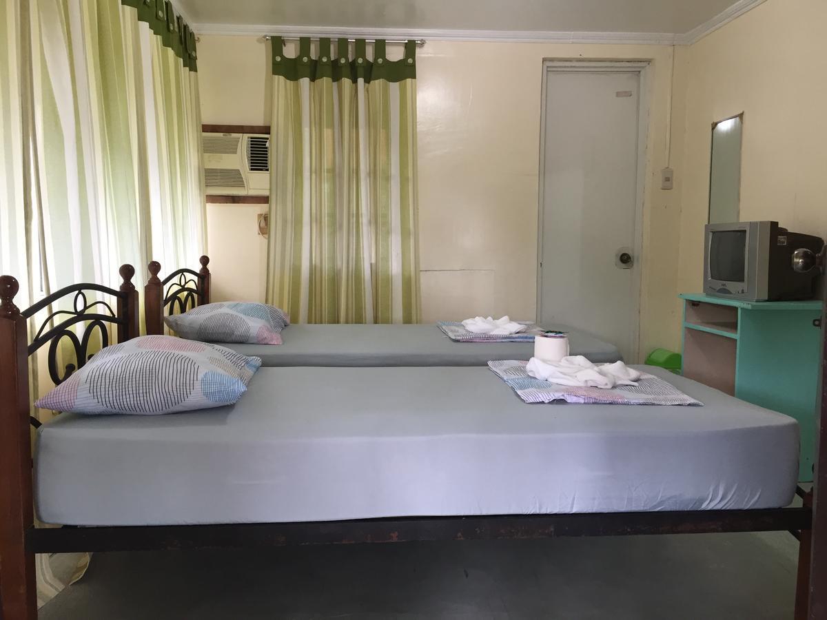 Punta Del Sol Araceli Beach Resort Самал Екстериор снимка