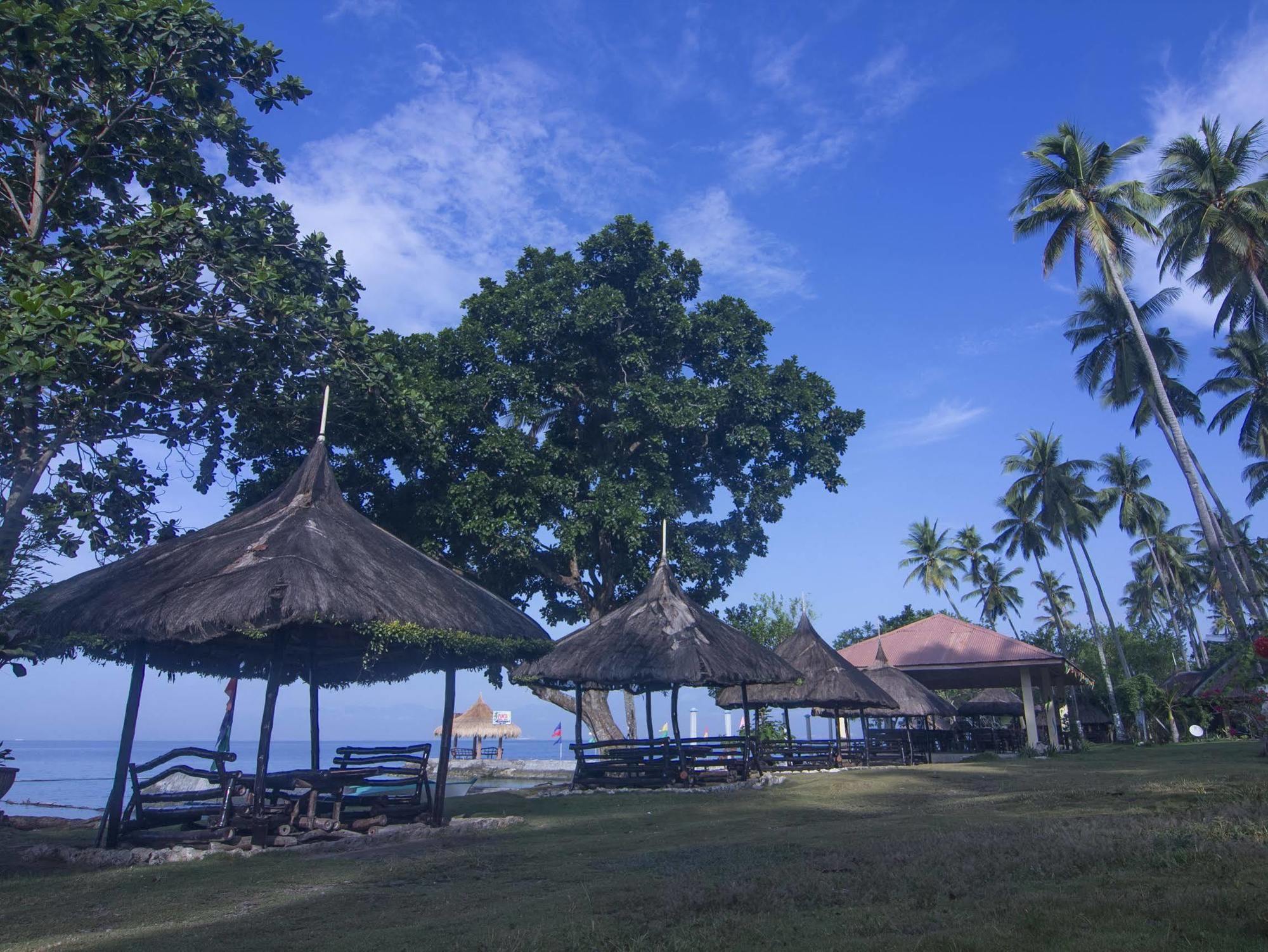 Punta Del Sol Araceli Beach Resort Самал Екстериор снимка