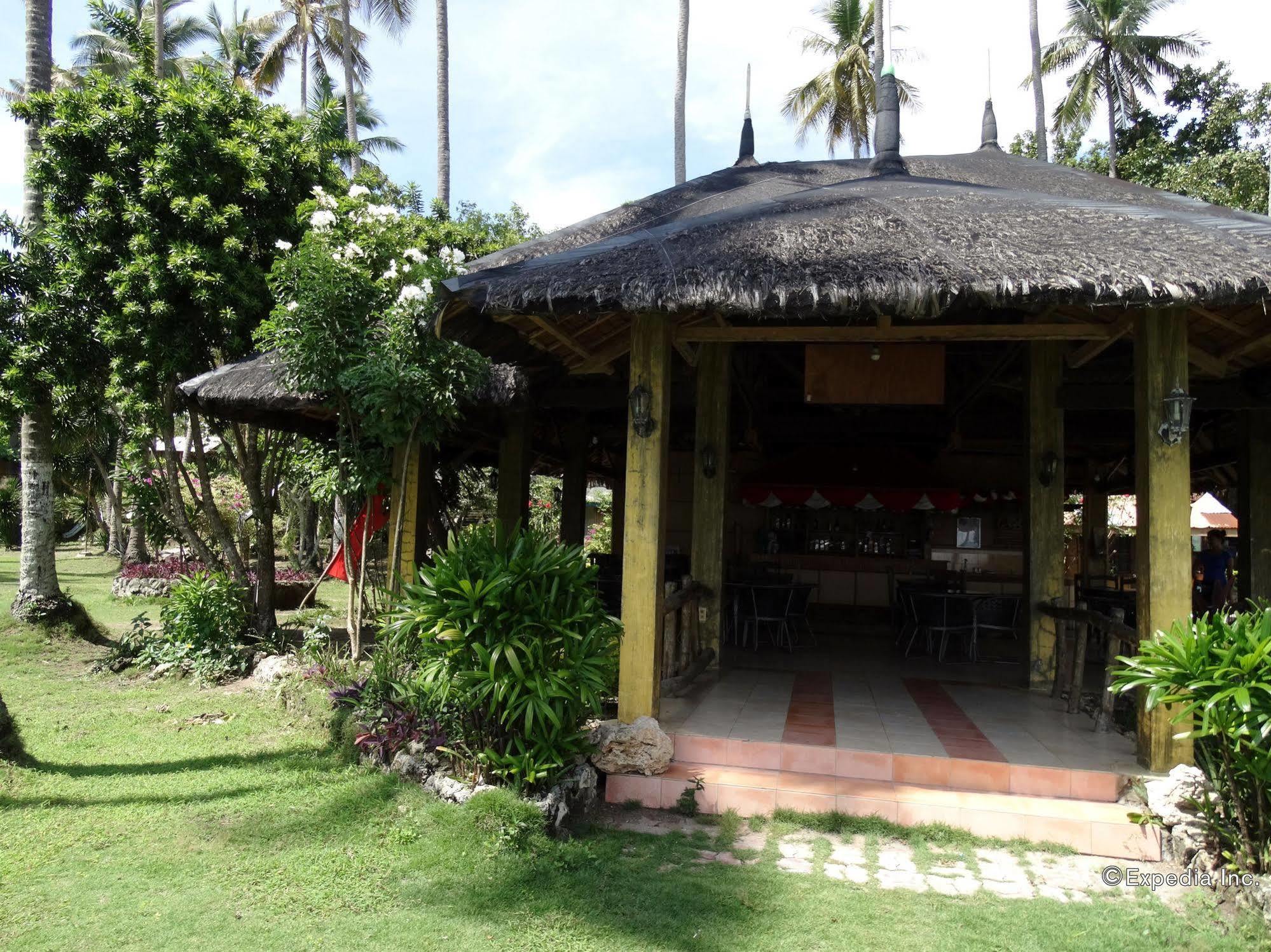 Punta Del Sol Araceli Beach Resort Самал Екстериор снимка