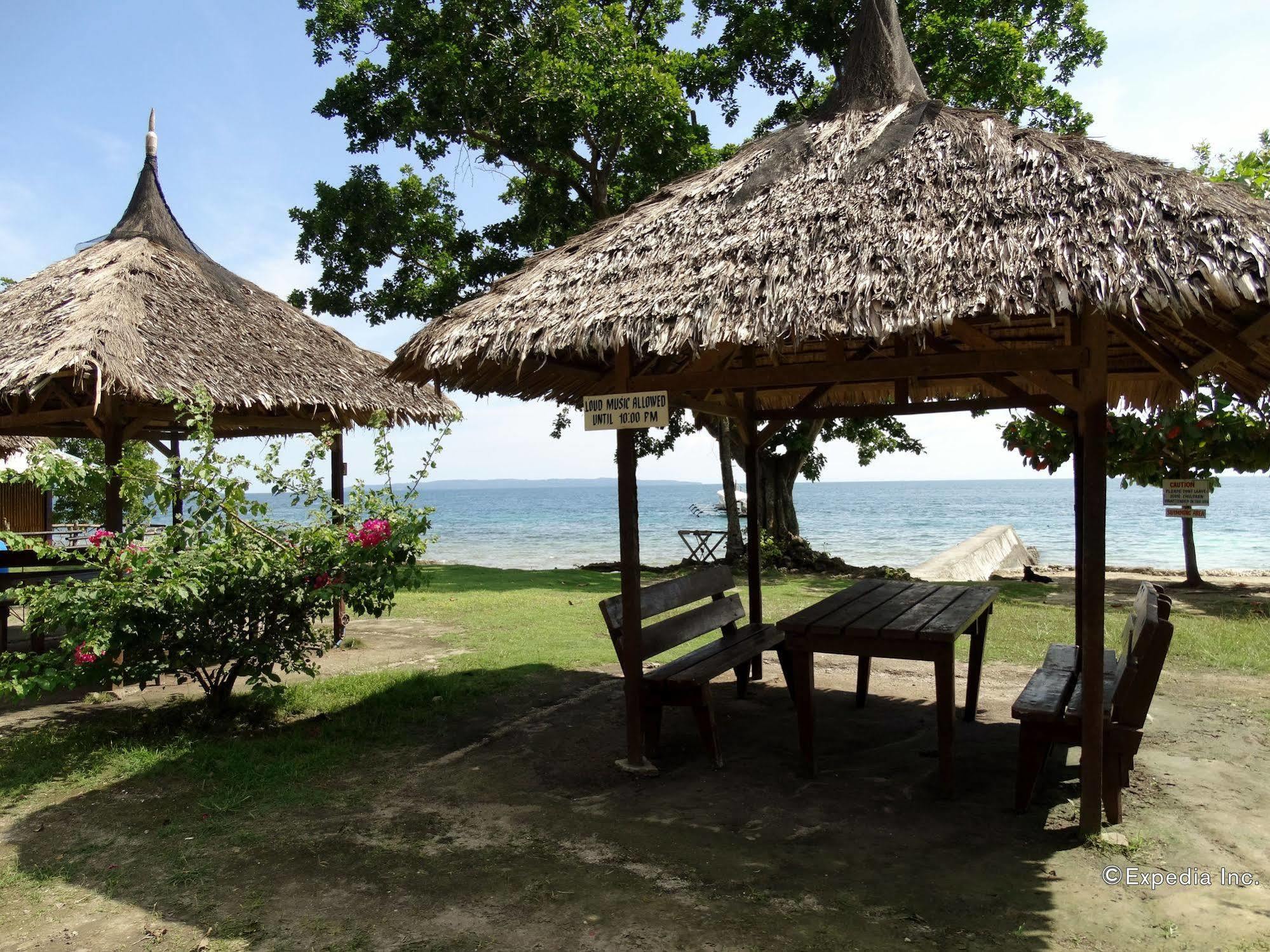 Punta Del Sol Araceli Beach Resort Самал Екстериор снимка
