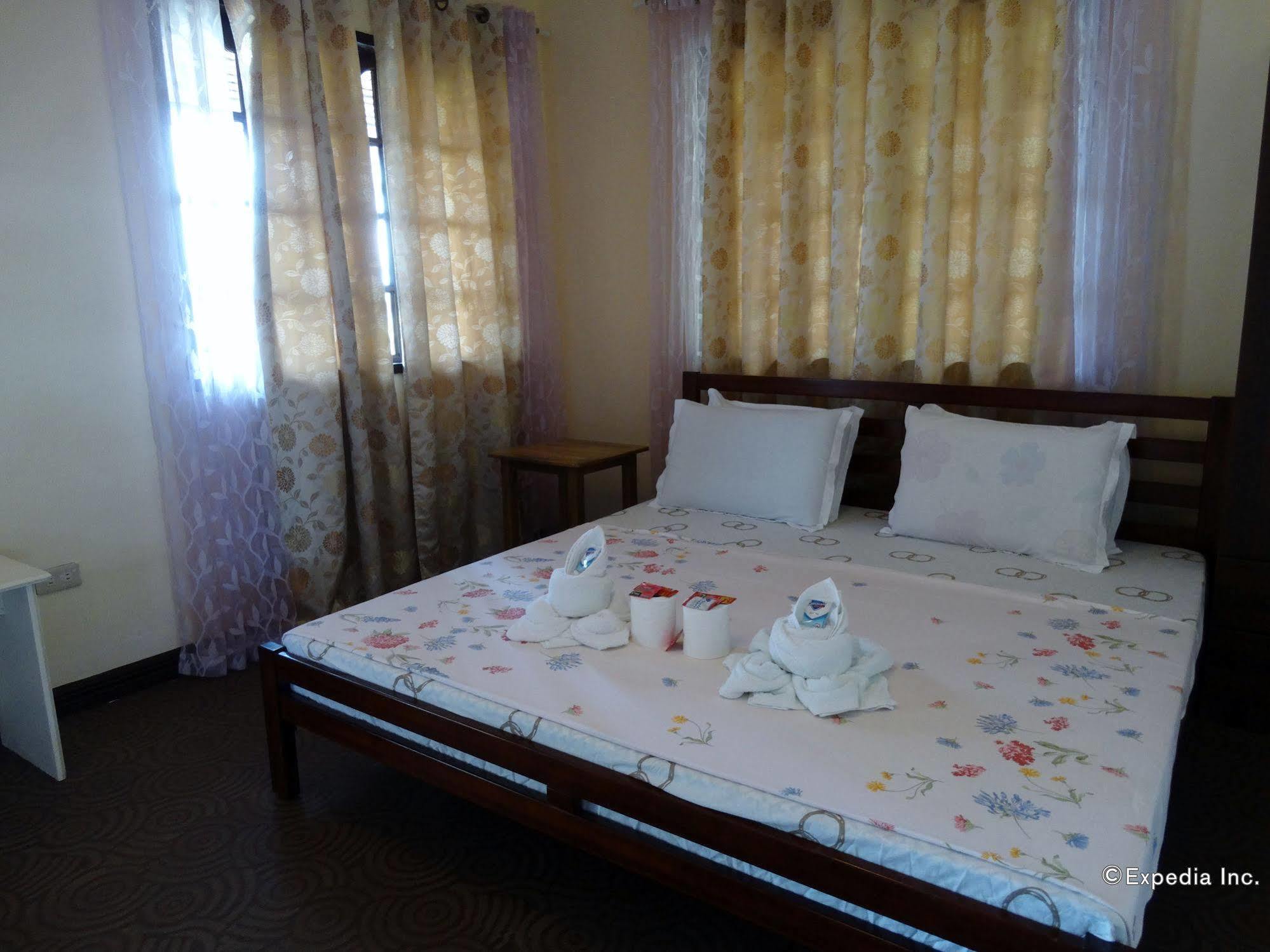 Punta Del Sol Araceli Beach Resort Самал Екстериор снимка