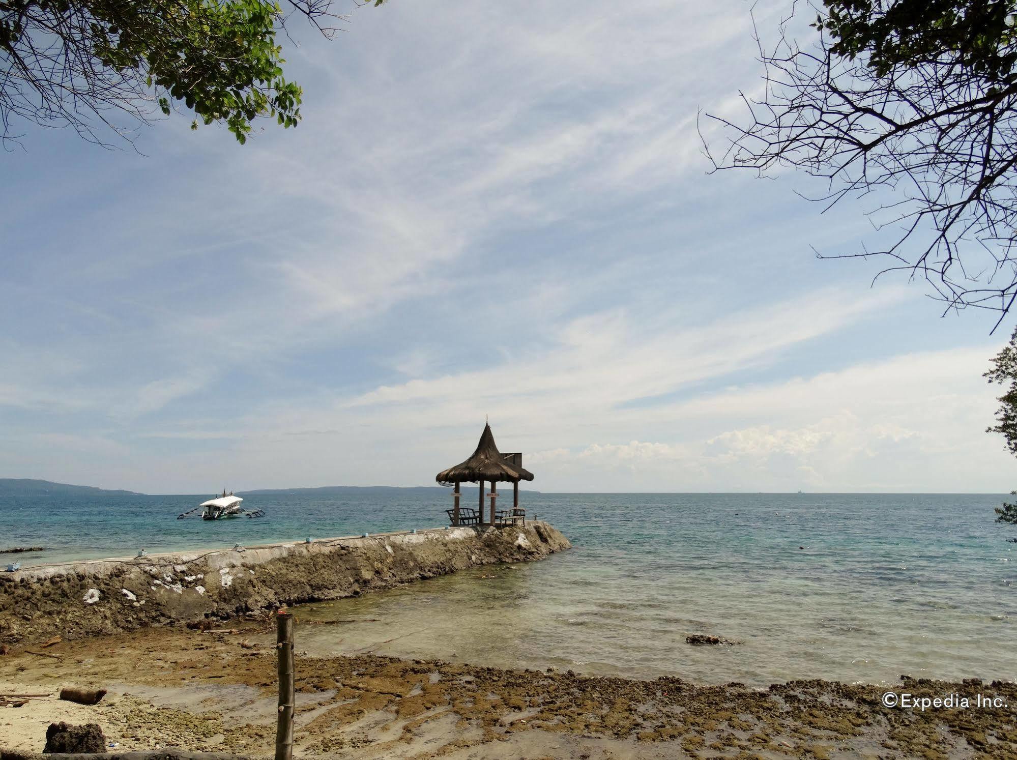 Punta Del Sol Araceli Beach Resort Самал Екстериор снимка